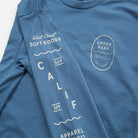 Bay Waves Standard Long Sleeve Shirt - Upper Park Clothing - Blue t-shirt with white text and branding on a white background