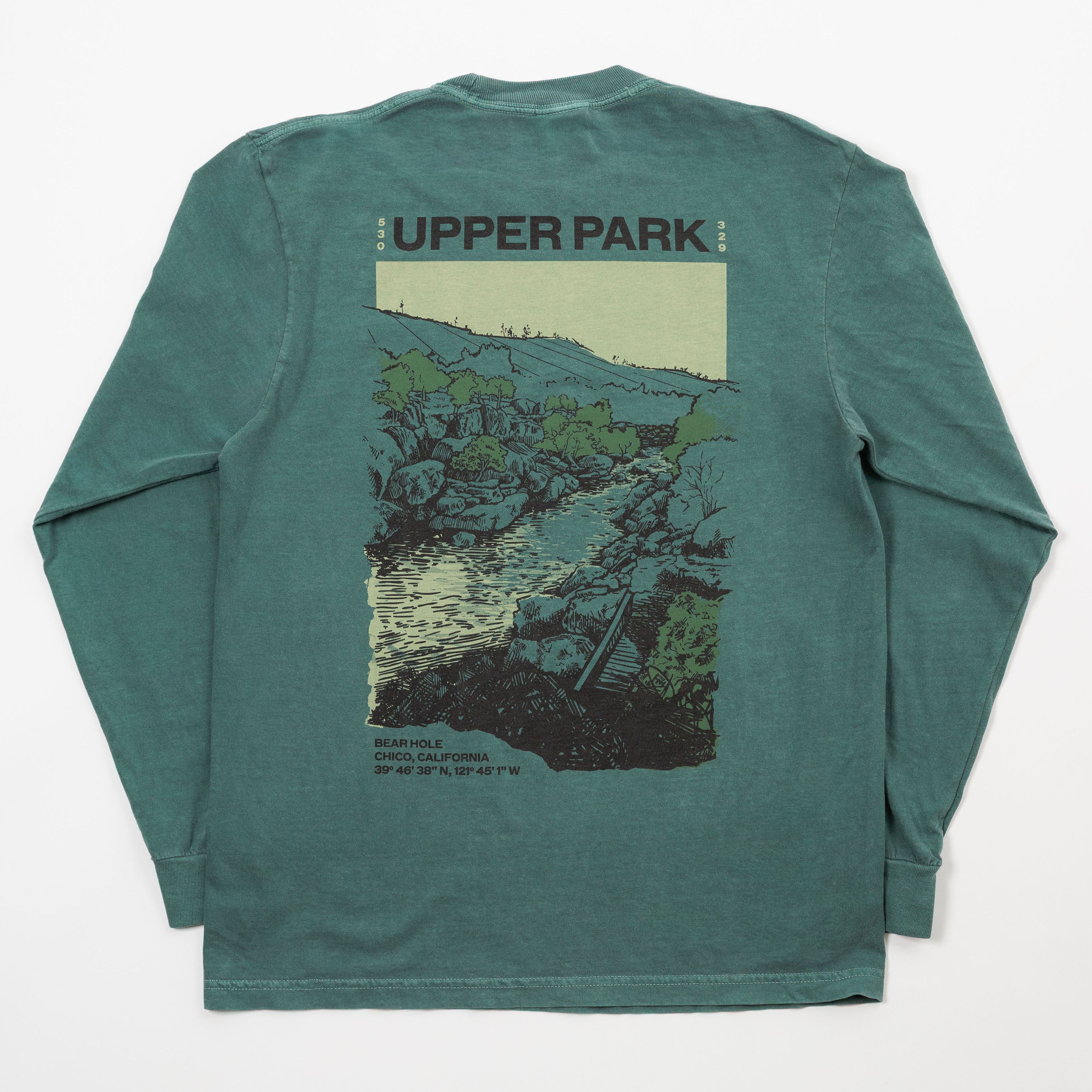 Green long-sleeve shirt with a nature graphic and 'Upper Park' text on the back, on a white background.