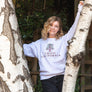 women standing in a tree in Downtown Chico California while wearing a Chico City of Trees Thrifty Crew from Upper Park Clothing