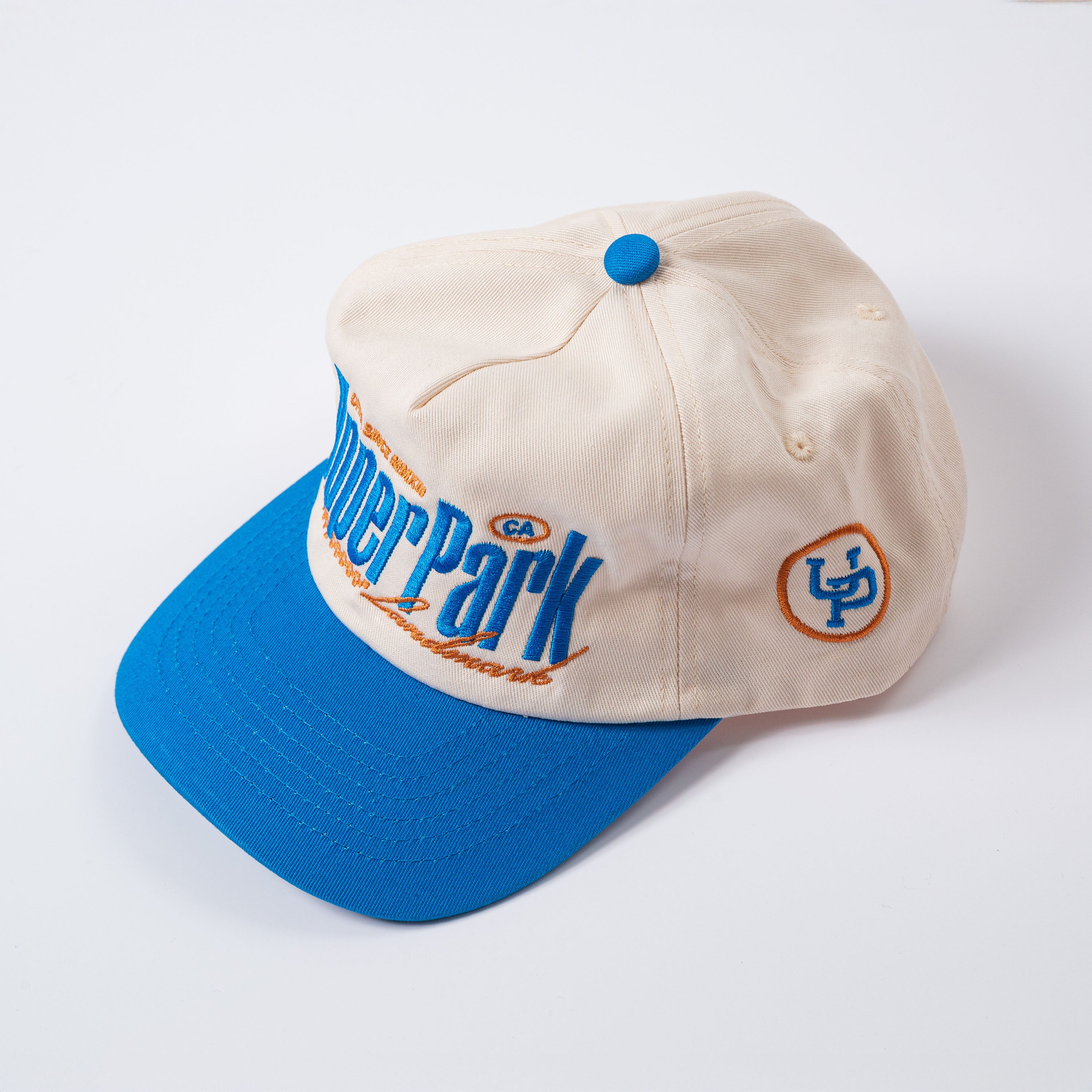 Beige and blue cap with 'Powerpark' branding on a white background - Rally Unstructured Vintage Style Hat