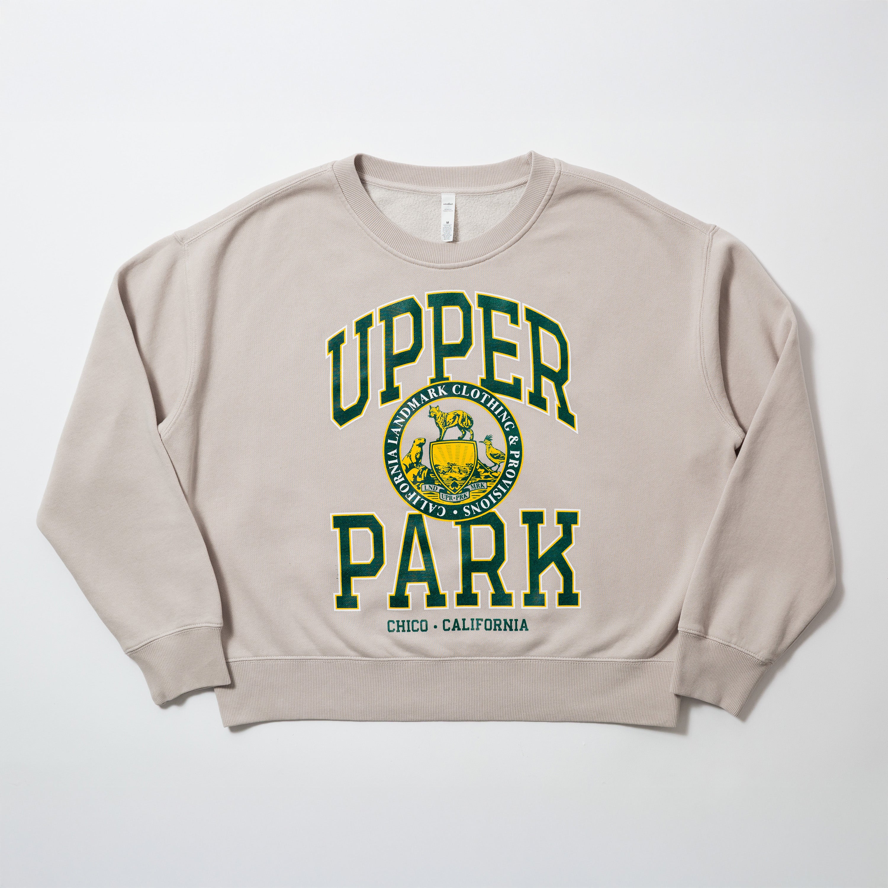 Women's Campus Crew Sweatshirt - Beige sweatshirt with 'Upper Park' text and logo on a white background