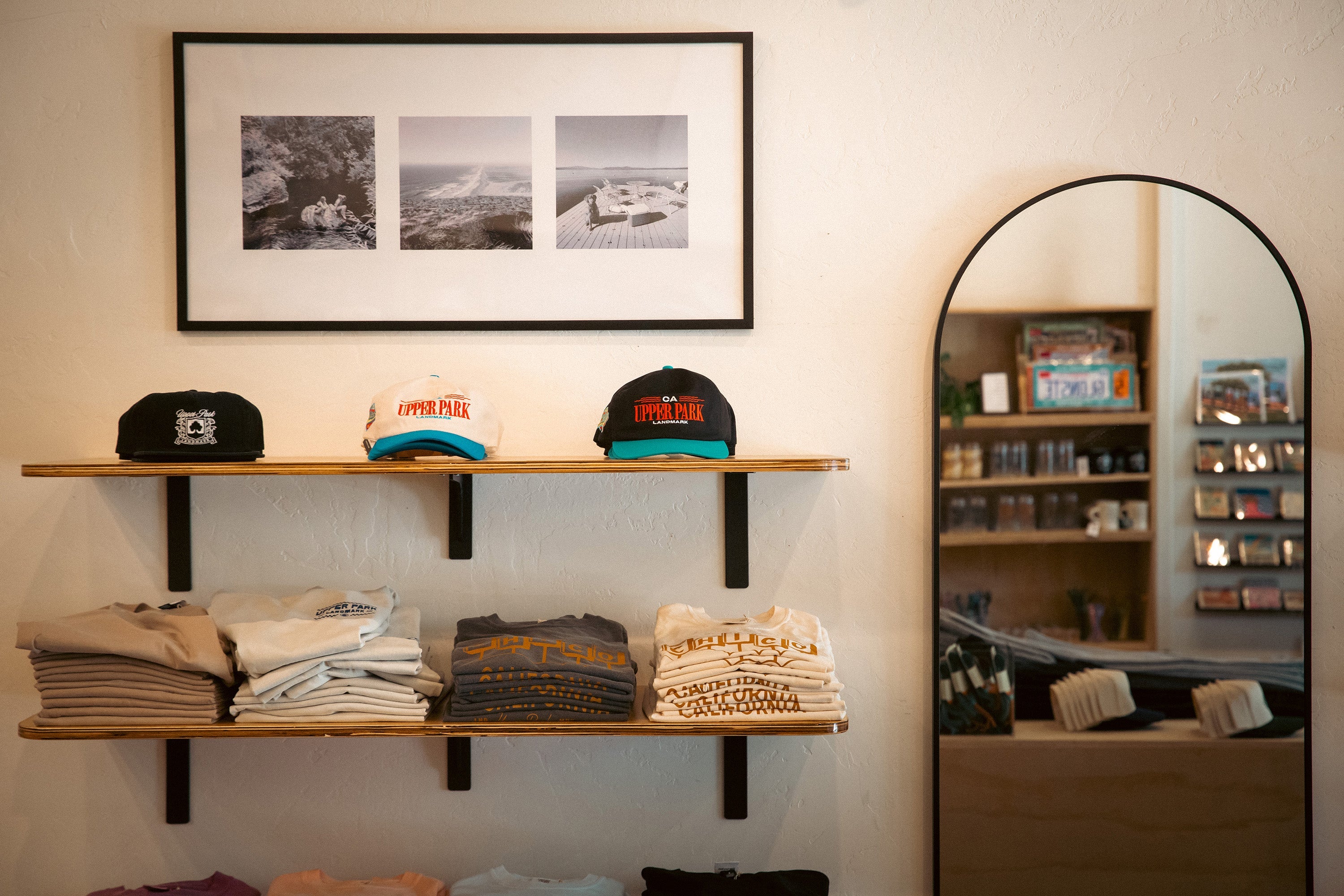 interior of Upper Park Clothing Store - Folded tees on shelves