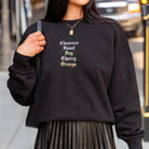 Woman wearing Embroidered Streets Women's Heavy Crew from Upper Park Clothing in Chico, Ca