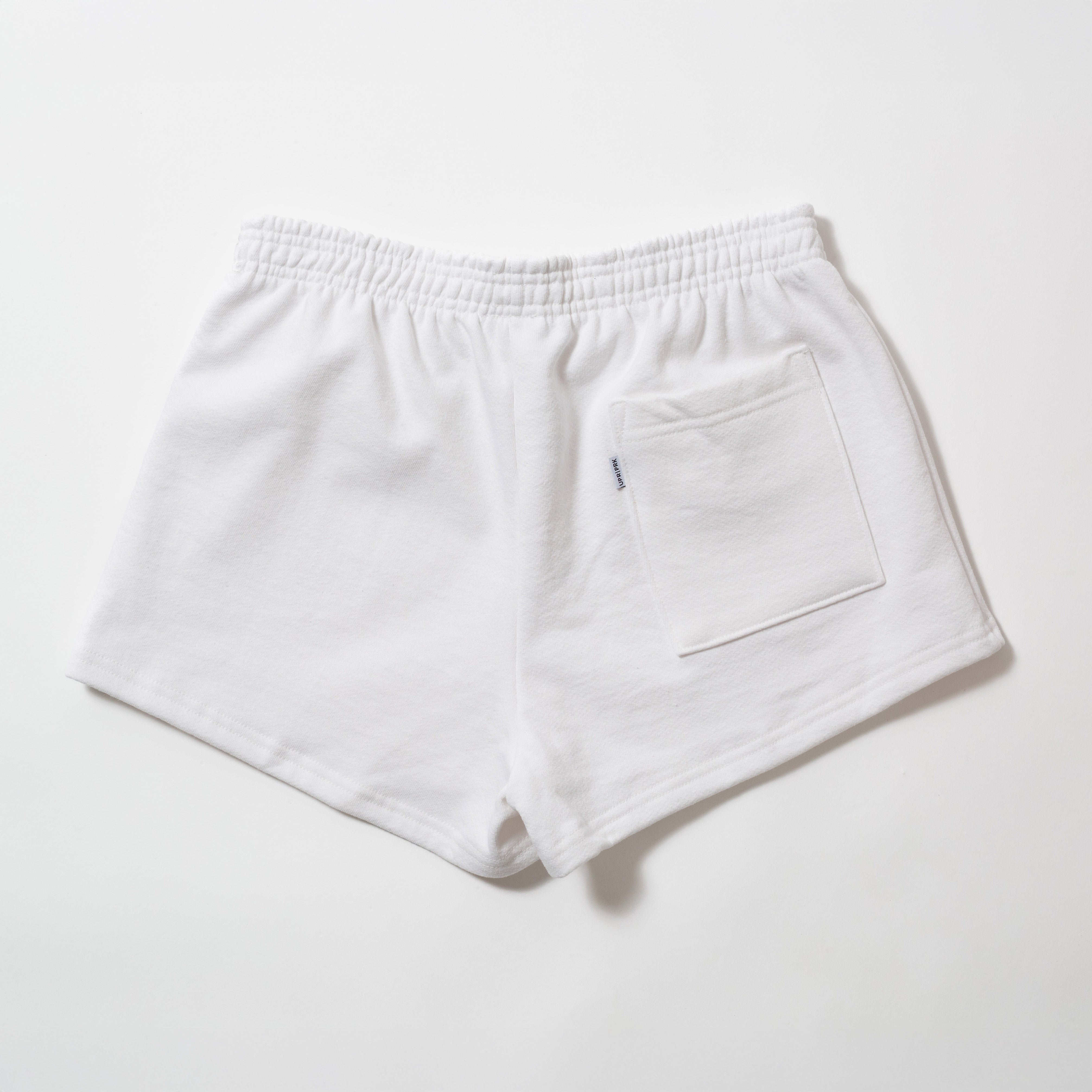 Basics Women's Heavy Fleece Cotton Shorts - White shorts with a pocket on a white background