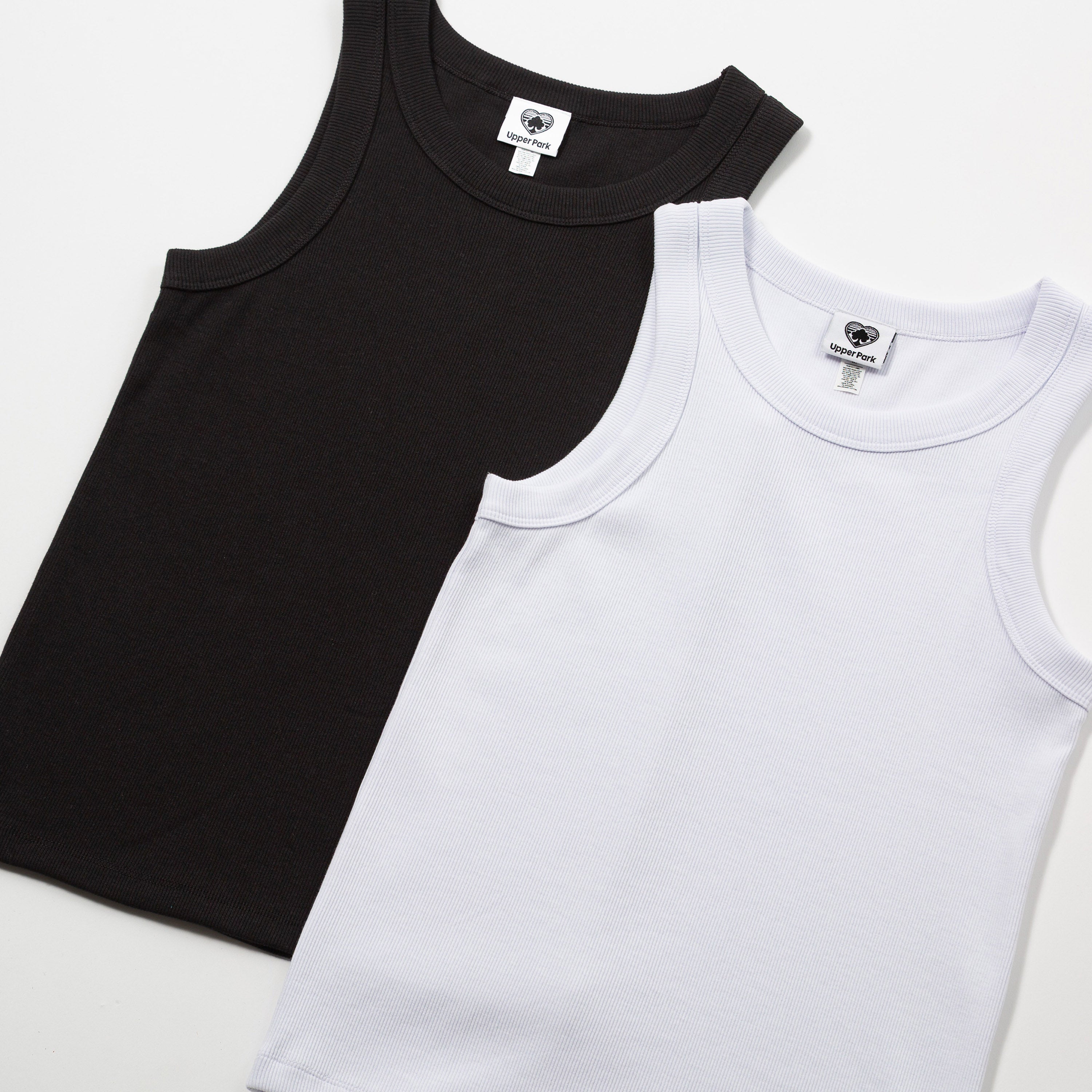 Basic Women's Organic Rib Tank - Black and white tank tops on a light gray background
