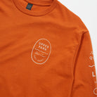 Bay Waves Standard Long Sleeve Shirt - Upper Park Clothing - Orange long-sleeve shirt with 'Upper Park' logo on a white background
