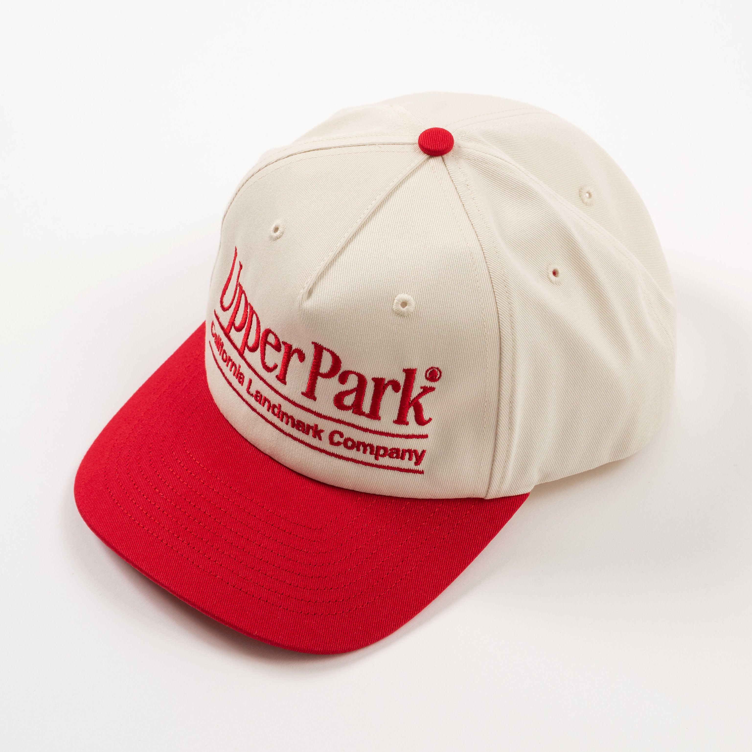 Vintage style baseball hat - Cream and red cap with 'Upper Park' logo on a white background - California Landmark Company