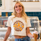 Woman wearing a California Poppy Love Crop Tee from Upper Park Clothing - Chico, Ca