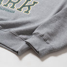 100% Cotton Oversize Crew Neck Sweater - Gray sweatshirt with text on a white background