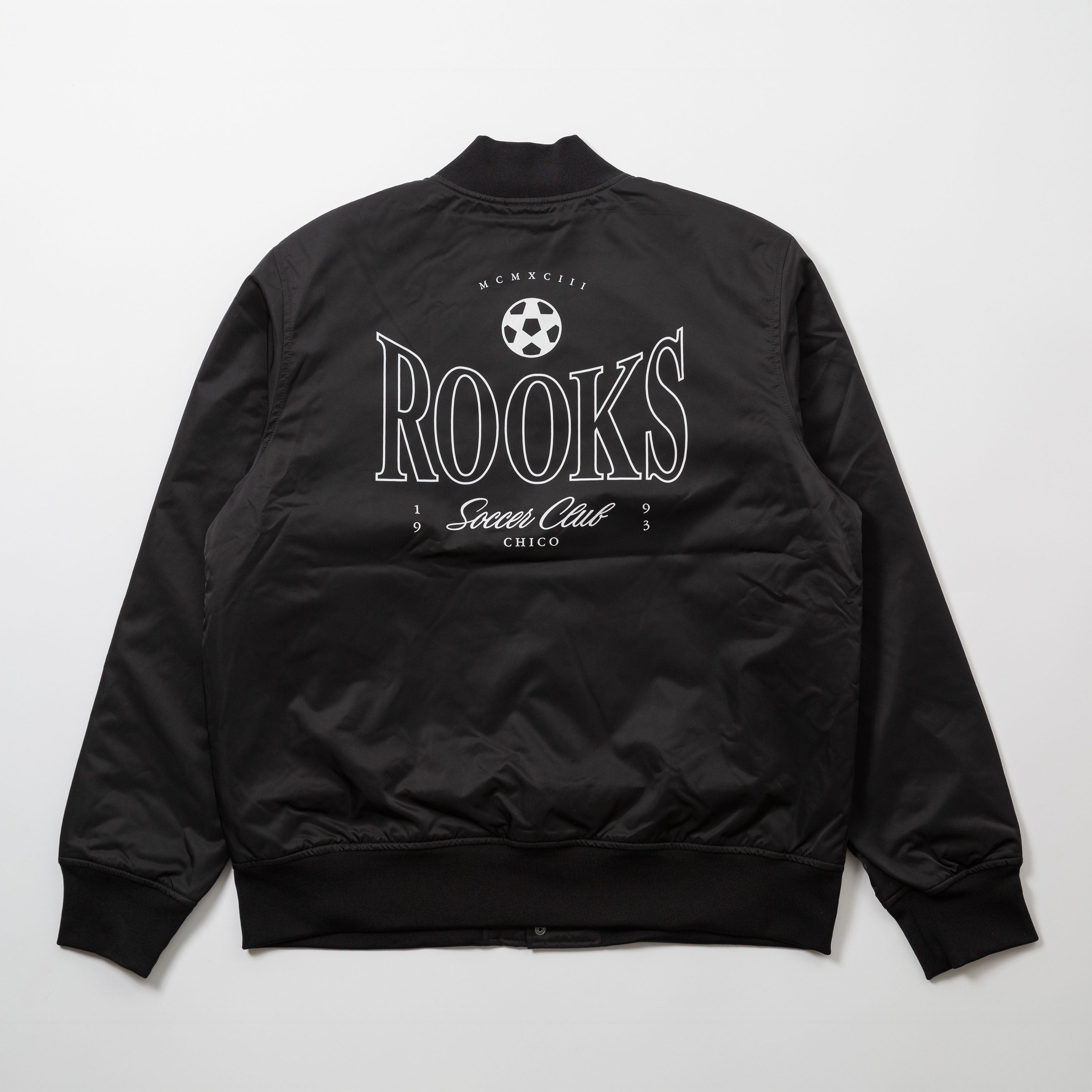 Chico Rooks Soccer Club x Upper Park Jacket - Black jacket with 'Rooks Soccer Club' text on a white background