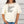 women standing in front of a garage door in Downtown Chico wearing a Downtown Chico Streets Scoop Neck Tee in the color ecru