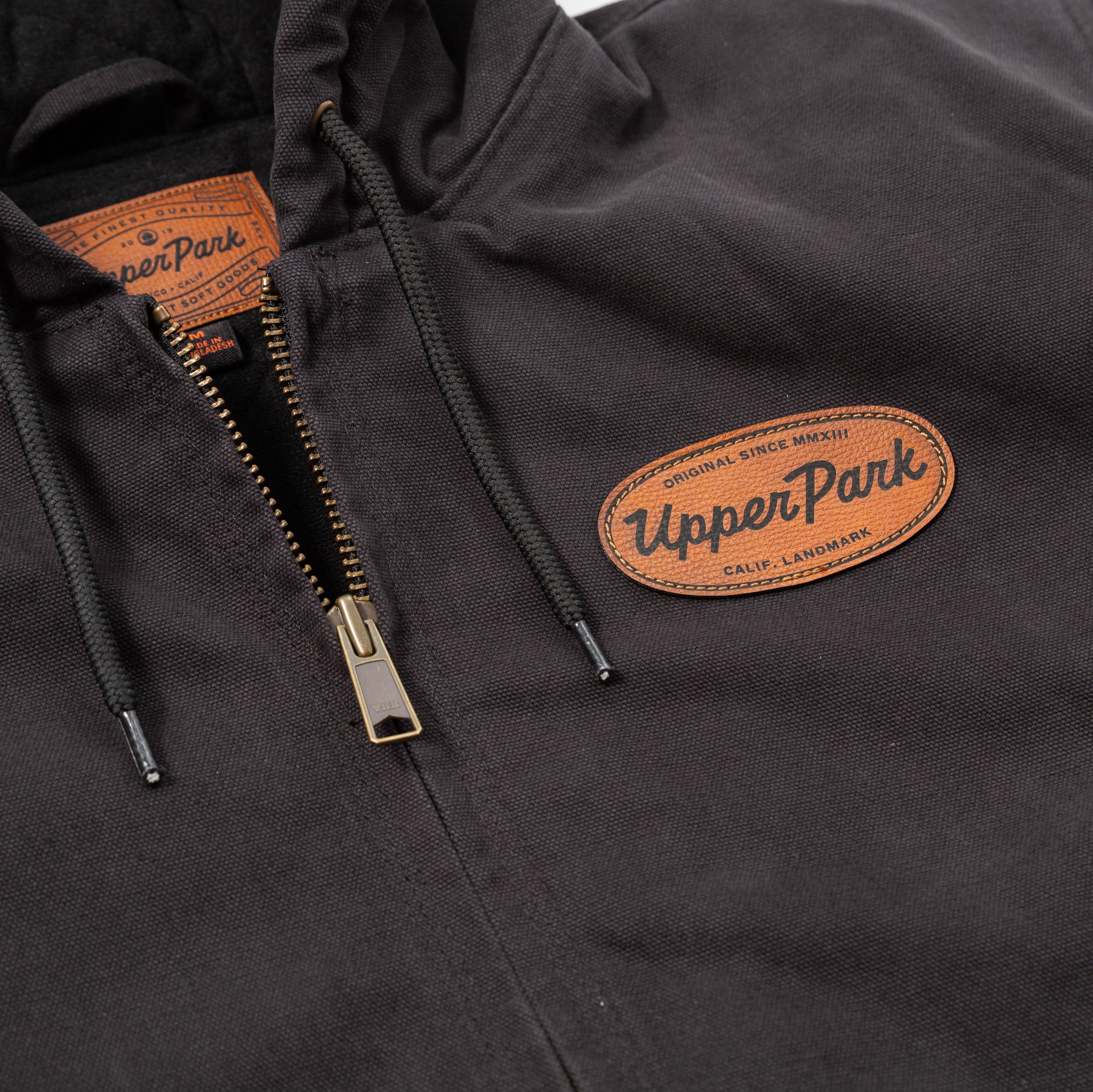 Black jacket with 'Upper Park' logo and zipper detail - Cultivators Upper Park Duck Canvas Jacket