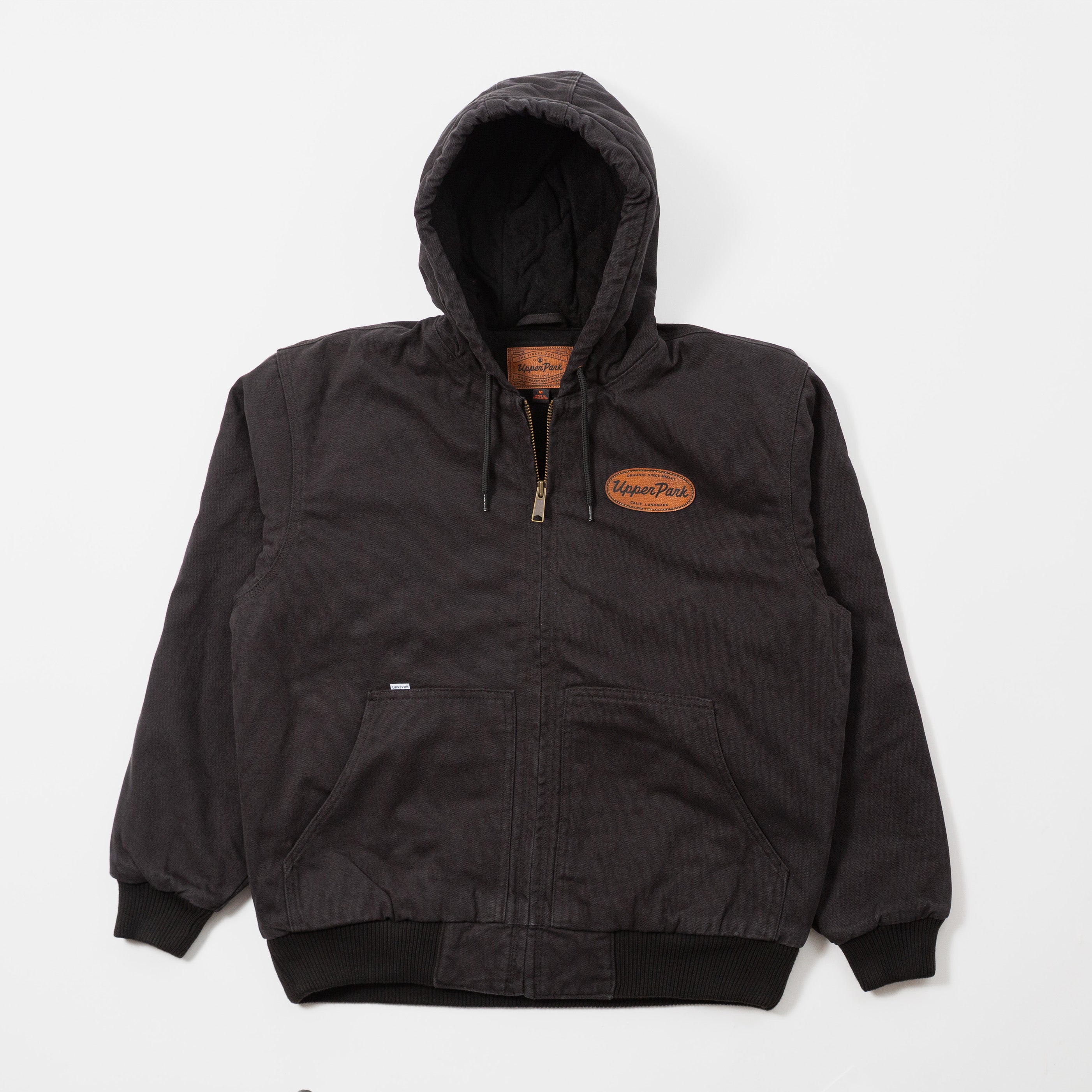 Black hooded jacket with a brand logo on a white background - Cultivators Upper Park Duck Canvas Jacket