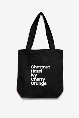 black colored tote bag with a updated graphic that spells Chico from Upper Park Clothing 