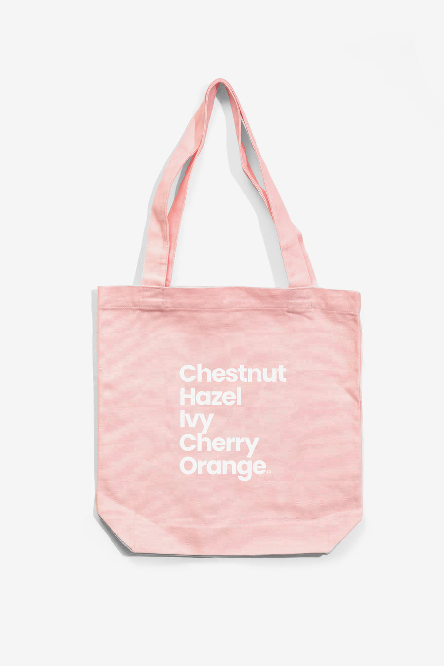 pink colored tote bag with a updated graphic that spells Chico from Upper Park Clothing 