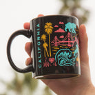 Hand holding a Golden State Mug from Upper Park Clothing in Chico, Ca