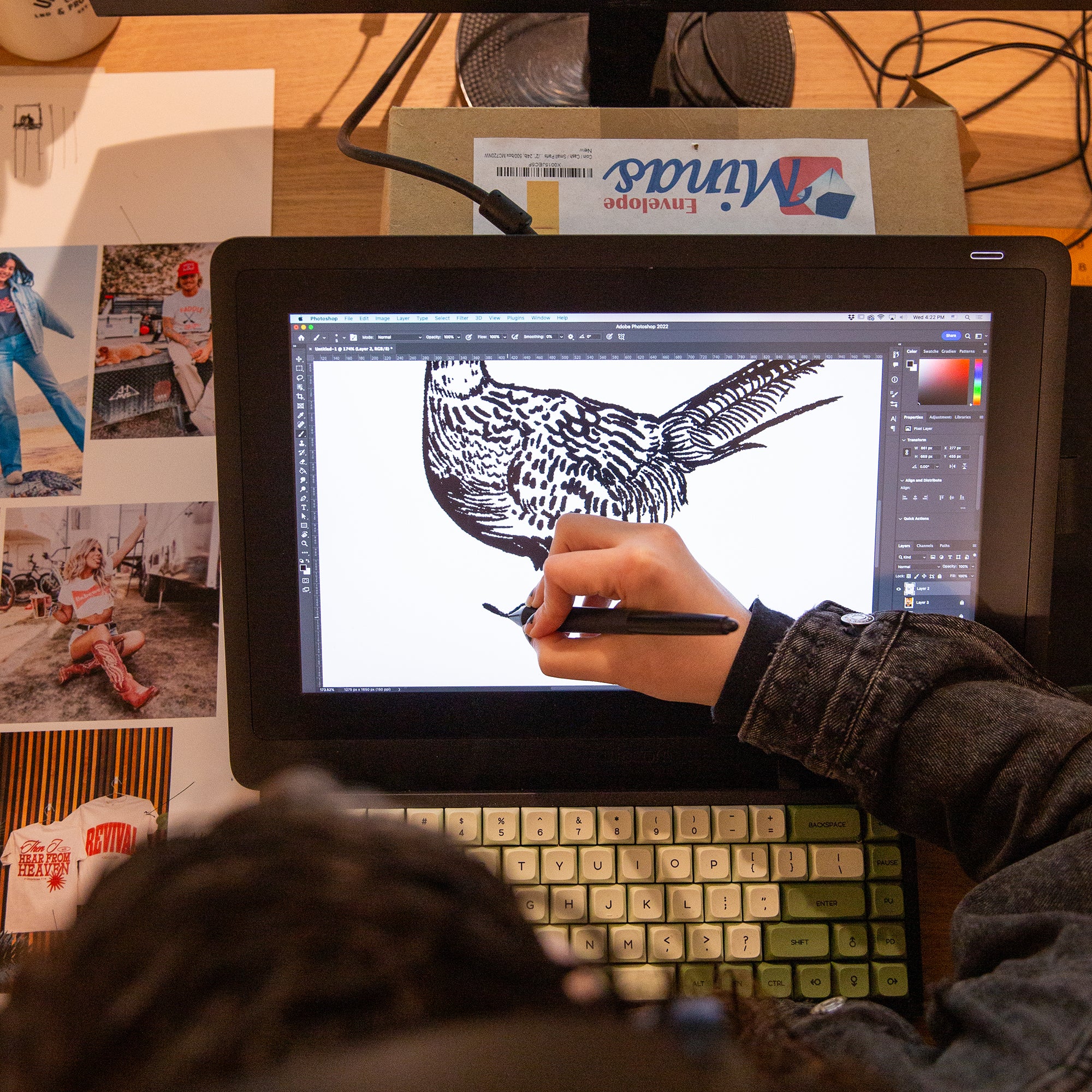 women drawing a quail bird on a wacom tablet for graphic design custom shirt design for Upper Park Clothing in Chico, California CA
