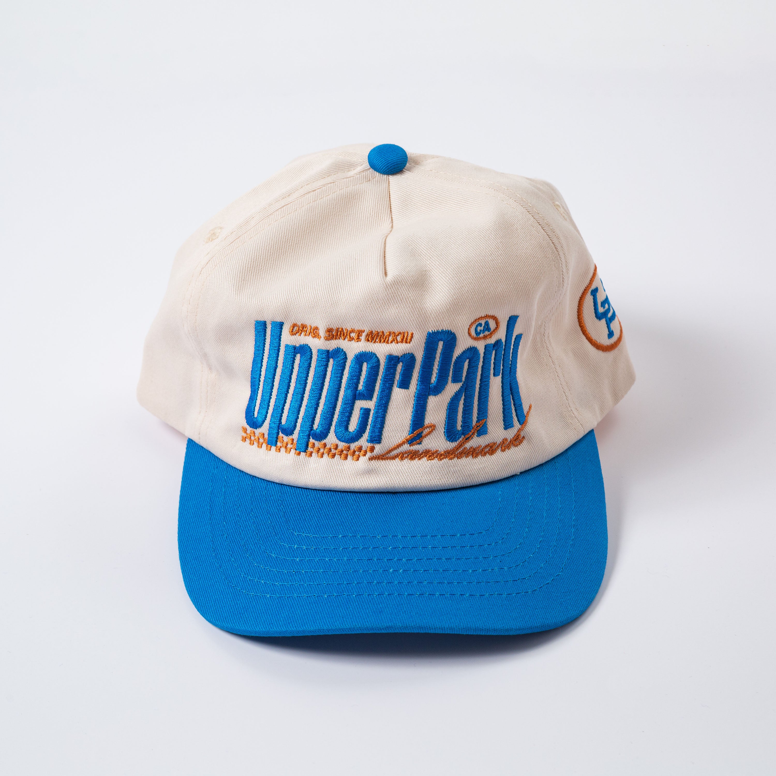 Beige and blue cap with 'Upper Park' branding on a white background - Rally Unstructured Vintage Style Hat