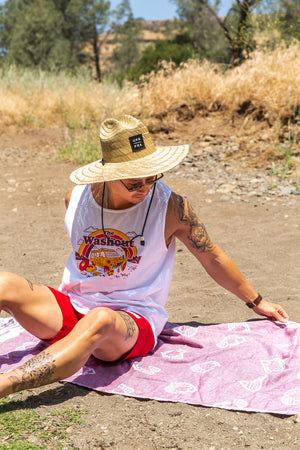 man sitting on a Turkish Towel from Upper Park Clothing in Upper Bidwell Park 