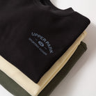 Black sleeveless shirt with 'Upper Park Sporting Goods' logo on a white background - Upper Park Athletics Sweater Set