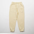 Yellow sweatpants with a brand logo on a light gray background - Upper Park Athletics Sweatpants Set