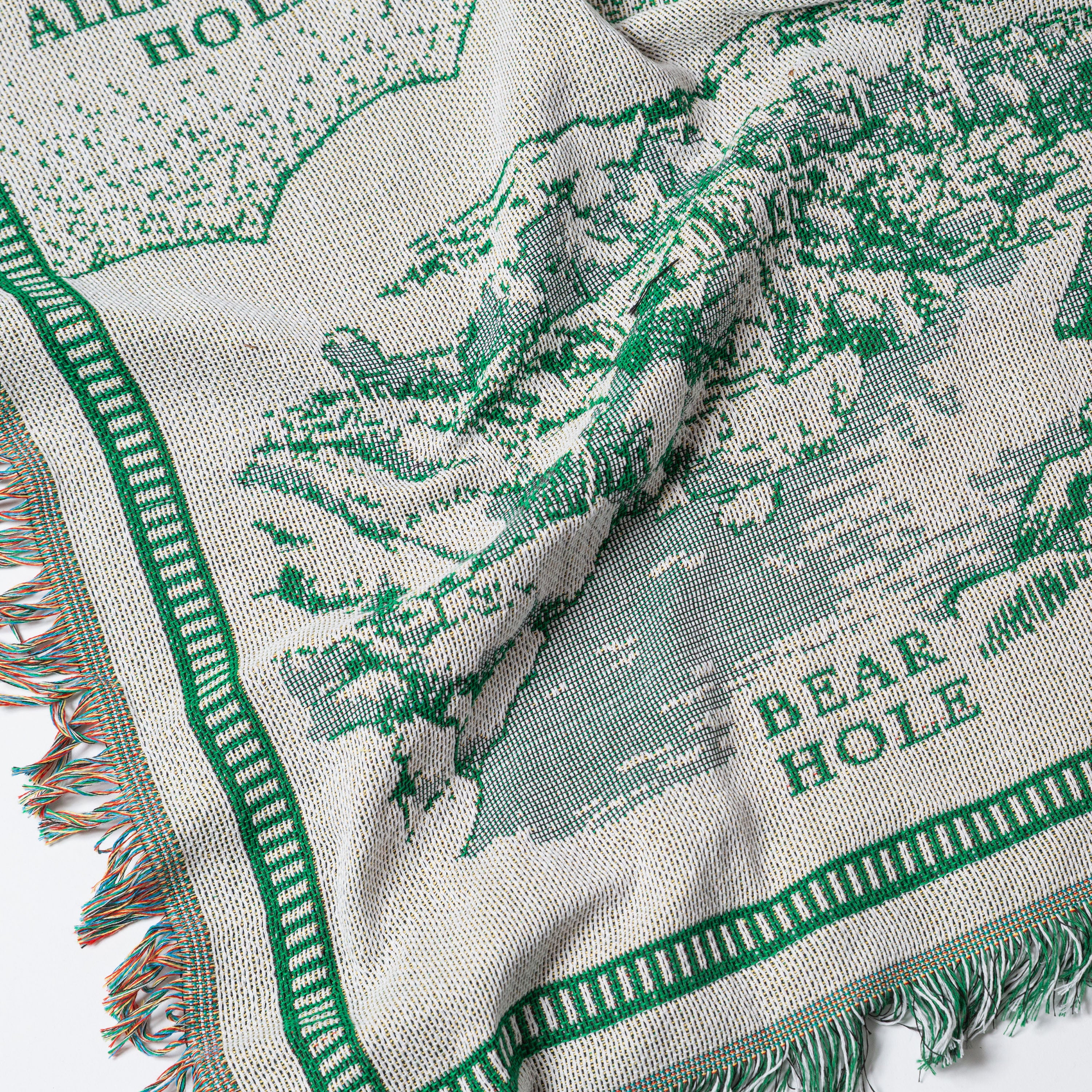 Textile with 'Bear Hole' branding and green and white pattern - Upper Bidwell Park Woven Blanket