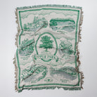 Green and white patterned blanket with text and images on a white background - Upper Bidwell Park Woven Blanket