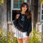 Woman wearing Embroidered Streets Women's Heavy Crew from Upper Park Clothing in Chico, CA