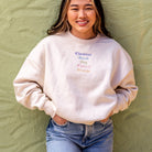 Woman wearing Embroidered Streets Women's Heavy Crew from Upper Park Clothing in Chico, Ca