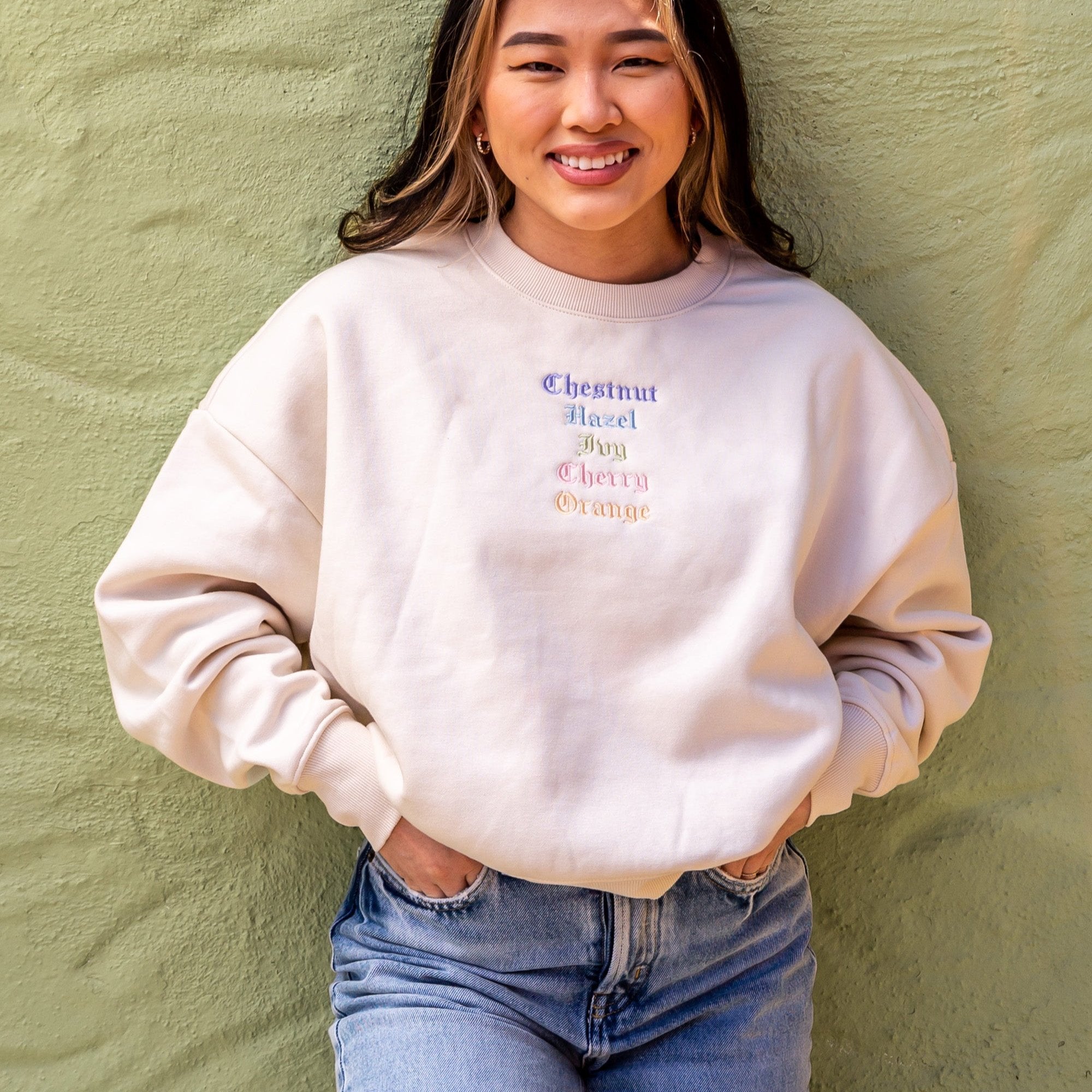 Woman wearing Embroidered Streets Women's Heavy Crew from Upper Park Clothing in Chico, Ca