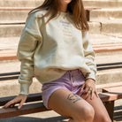 Woman wearing Embroidered Streets Women's Heavy Crew from Upper Park Clothing in Chico, CA